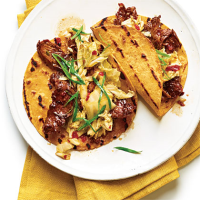 Korean-Style Beef Tacos Recipe | MyRecipes image