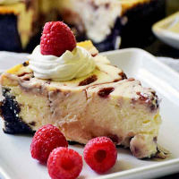 Raspberry White Chocolate Cheesecake with Oreo Crust ... image