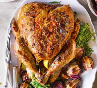Crispy bacon-basted turkey recipe | BBC Good Food image