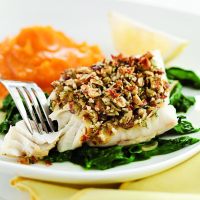 Almond-&-Lemon-Crusted Fish with Spinach Recipe | EatingWell image