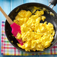 Fluffy Scrambled Eggs Recipe: How to Make It - Taste of Home: Find Recipes, Appetizers, Desserts, Holiday Recipes & Healthy Cooking Tips image