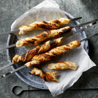 Campfire Biscuits on a Stick Recipe | EatingWell image