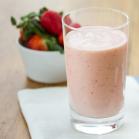 Strawberry-Orange Creme Smoothies Recipe | Allrecipes image