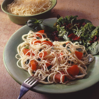Angel Hair Pasta With Basil & Tomatoes Recipe | Land O’Lakes image