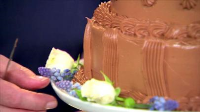 Tiered Chocolate Buttercream Cake Recipe | Ina Garten ... image