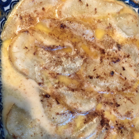 Pears Baked in Amaretto Cream Recipe | Allrecipes image
