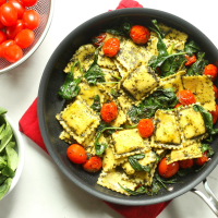 Pesto Ravioli with Spinach & Tomatoes Recipe | EatingWell image