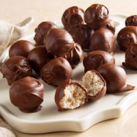 Chocolate Bonbons Recipe: How to Make It - Taste of Home: Find Recipes, Appetizers, Desserts, Holiday Recipes & Healthy Cooking Tips image