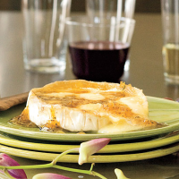 Warm Brie With Ginger-Citrus Glaze Recipe | MyRecipes image