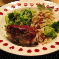 Brie Pecan Rollups with Raspberry Sauce Recipe | Allrecipes image