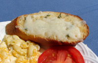 Cheesy Baked Garlic Bread Slices Recipe - Cheese.Food.com image