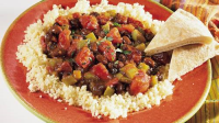 Spicy Black Beans with Couscous Recipe - Pillsbury.com image