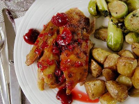 Crisp-Tender Roast Duck with Cherry-Rosemary Sauce Recipe | Ted Allen | Food Network image