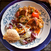 Pork and Chicken Paella with Brussels Sprouts | Better ... image