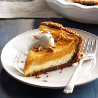 Double-Layer Pumpkin Cheesecake Recipe: How to Make It - Taste of Home: Find Recipes, Appetizers, Desserts, Holiday Recipes & Healthy Cooking Tips image