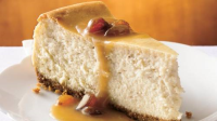 Hot Buttered Rum Cheesecake with Brown Sugar-Rum Sauce ... image