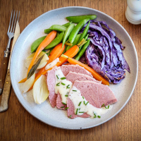 Traditional corned beef with mustard sauce and vegetables ... image