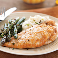 Chicken and Asparagus in White Wine Sauce Recipe | MyRecipes image