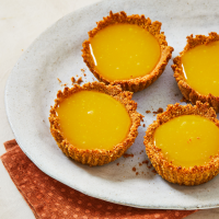 Mini Lemon Curd Tarts Recipe | EatingWell image