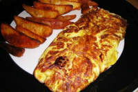 Caramelized garlic and onion omelette with cheese - Recipe ... image