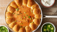Skillet Queso Dip with Taco Biscuit Bombs Recipe ... image