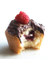 Jam Cupcakes with Chocolate Frosting Recipe | Martha Stewart image