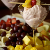 Vanilla Cheesecake with Cherry Topping Recipe | MyRecipes image
