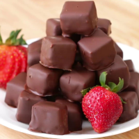 Chocolate-Covered Cheesecake Bites Recipe by Tasty image