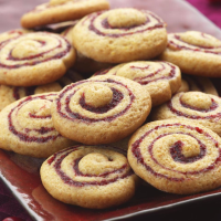 Cranberry-Honey Spice Pinwheel Cookies Recipe | EatingWell image