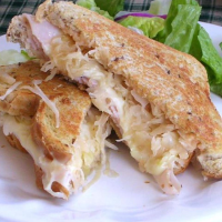 Grilled Turkey Reuben Sandwiches Recipe | Allrecipes image