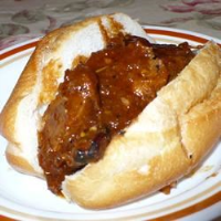 Tangy Sliced Pork Sandwiches Recipe | Allrecipes image