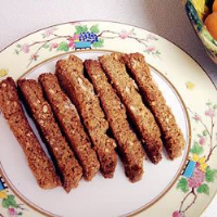 Ginger Biscotti with Pistachios Recipe | Allrecipes image