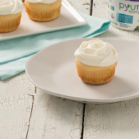 Vanilla Cupcakes with Vanilla Whipped Cream Frosting ... image