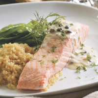 Poached Salmon with Creamy Piccata Sauce Recipe | EatingWell image