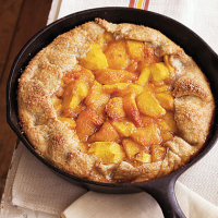 Rustic Spiced Peach Tart with Almond Pastry Recipe | MyRecipes image