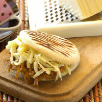 Arepa Filled with Shredded Beef & Yellow Cheese image