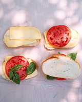 Grilled Cheese with Tomato and Basil Recipe | Martha Stewart image