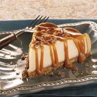 Caramel Praline-Topped Cheesecake Recipe: How to Make It - Taste of Home: Find Recipes, Appetizers, Desserts, Holiday Recipes & Healthy Cooking Tips image