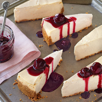 Vanilla Cheesecake with Cherry Topping Recipe | MyRecipes image
