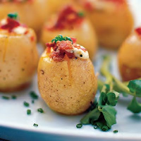 Roasted Potatoes with Chives, Bacon, and Maytag Blue Cheese image