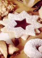 Raspberry-Star Sandwich Cookies - Good Housekeeping image