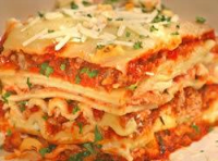 Loaded Four Cheese and Three meat Lasagna | Just A Pinch ... image