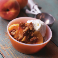 Streusel-Topped Peach Crisp Recipe | Land O’Lakes image