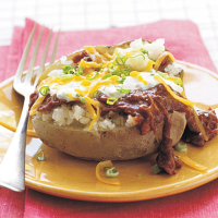Barbecue-Stuffed Potatoes Recipe | MyRecipes image