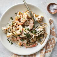 Chicken & Shrimp Alfredo Recipe | EatingWell image