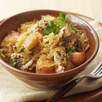 Sauerkrat, Pork, and Potatoes Recipe | EatingWell image