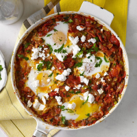 Baked Eggs, Tomatoes & Chiles (Shakshuka) Recipe | EatingWell image