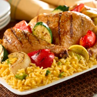 Grilled Chicken & Veggies Over Rice Recipe | MyRecipes image