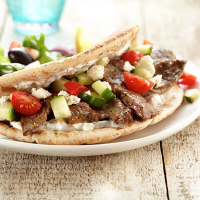 Greek Lamb Pita with Tzatziki Sauce Recipe | Land O’Lakes image