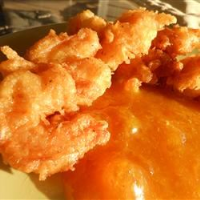 Cajun Shrimp with Tangy Peach Sauce Recipe | Allrecipes image